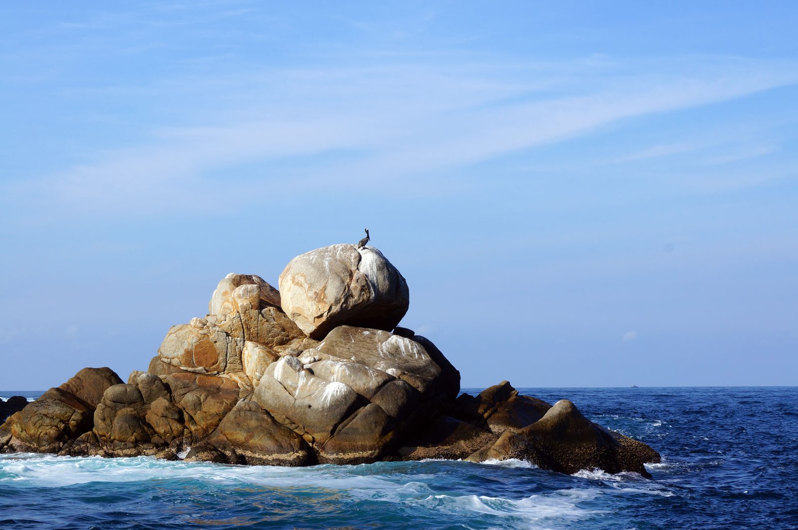 Sea stacks at the mouth of the bay, with seabird colonies
