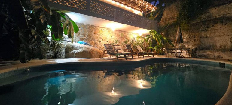 The pool at the apartment where the group stays